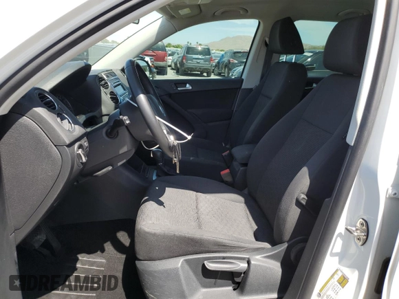 2014 Volkswagen Tiguan SE with VIN WVGAV3AX0EW614369, listed as a Copart auction lot 57664045 with 85,504 mi miles and Salvage title. Bid and sale history available at DreamBid. Image 7.