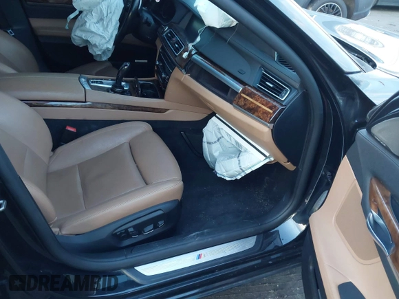 2015 BMW 7 Series 740Li xDrive with VIN WBAYF4C51FGS99074, listed as a IAAI auction lot 41222498 with 132,789 mi miles. Bid and sale history available at carsss.com. Image 5.