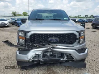 2023 Ford F-150 XL with VIN 1FTEX1EP9PKE34381, listed as a Copart auction lot 63938505 with 13,933 mi miles and Salvage title. Bid and sale history available at DreamBid. Image 5.