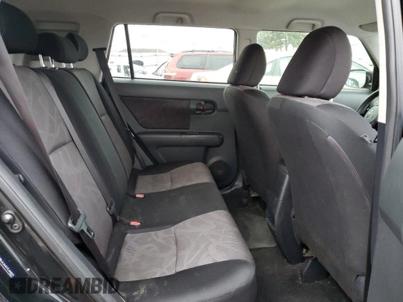 2014 Scion xB z VIN JTLZE4FE7EJ049074, wystawiony jako Copart lot #85734414 z przebiegiem 102 358 mil mil oraz Szkoda całkowita • Salvage title. Historia ofert i sprzedaży dostępna na DreamBid. Obrazek 11.