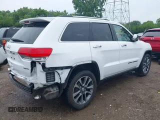2018 Jeep Grand Cherokee Limited with VIN 1C4RJFBG8JC417240, listed as a IAAI auction lot 42476411 with 77,080 mi miles and . Bid and sale history available at DreamBid. Image 4.