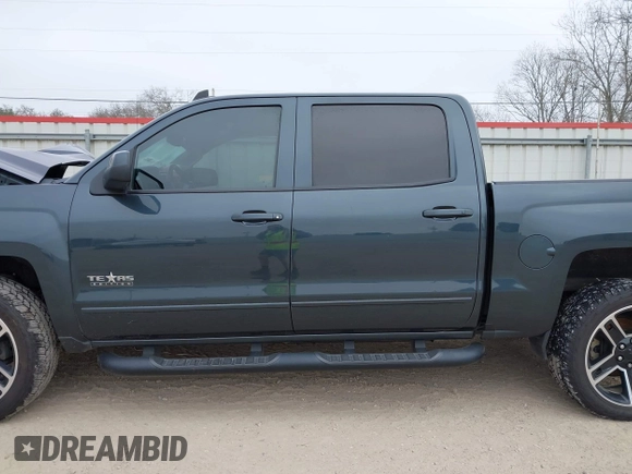 2018 Chevrolet Silverado 1500 LT with VIN 3GCPCREC1JG497019, listed as a IAAI auction lot 41459936 with 52,691 mi miles and . Bid and sale history available at DreamBid. Image 14.