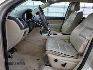 2015 Jeep Grand Cherokee High Altitude with VIN 1C4RJECG4FC669809, listed as a Copart auction lot 88909645 with 115,752 mi miles and Salvage Title. Bid and sale history available at carsss.com. Image 7.