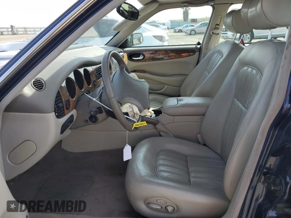 2000 Jaguar XJ with VIN SAJDA14C7YLF18873, listed as a Copart auction lot 50032495 with Not Provided miles and Salvage Title. Bid and sale history available at DreamBid. Image 7.