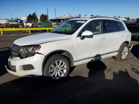 2012 Volkswagen Touareg Exec with VIN WVGEF9BP7CD009869, listed as a Copart auction lot 88099145 with Not Provided miles and Salvage Title. Bid and sale history available at DreamBid. Image 1.