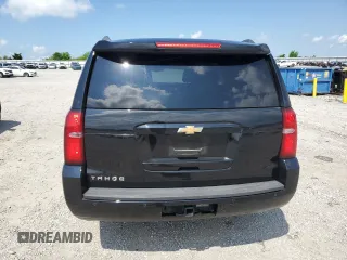 2020 Chevrolet Tahoe LT with VIN 1GNSKBKC2LR111551, listed as a Copart auction lot 57147985 with 134,867 mi miles and Salvage title. Bid and sale history available at DreamBid. Image 6.