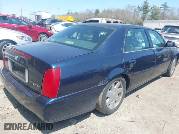 2002 Cadillac DeVille DTS with VIN 1G6KF57912U205527, listed as a IAAI auction lot 42064174 with 135,002 mi miles. Bid and sale history available at carsss.com. Image 4.