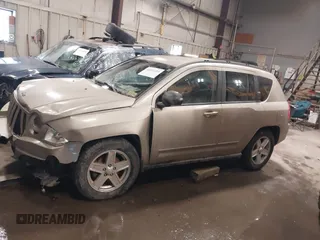 2010 Jeep Compass Sport with VIN 1J4NF4FB7AD501587, listed as a IAAI auction lot 41514419 with 154,826 mi miles. Bid and sale history available at carsss.com. Image 14.