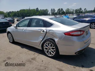 2014 Ford Fusion Titanium с VIN 3FA6P0K90ER363283, выставлен на аукционе Copart как лот 55156795 с пробегом 54 099 миль миль и Списание • Salvage title. История ставок и продаж доступна на DreamBid. Изображение 2.