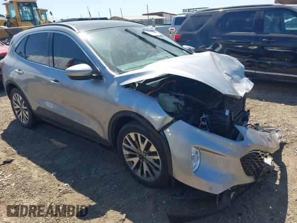 2021 Ford Escape Titanium Hybrid z VIN 1FMCU0DZ3MUB04065, wystawiony jako IAAI lot #41764797 z przebiegiem 28 881 mil mil oraz . Historia ofert i sprzedaży dostępna na DreamBid. Obrazek 1.