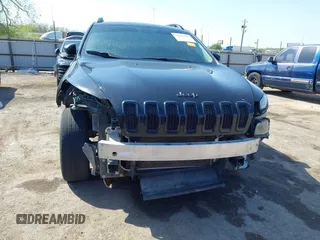2017 Jeep Cherokee Sport z VIN 1C4PJLAB7HW617014, wystawiony jako IAAI lot #42024427 z przebiegiem 196 968 mil mil oraz . Historia ofert i sprzedaży dostępna na DreamBid. Obrazek 13.