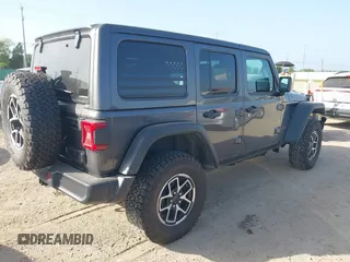 2025 Jeep Wrangler Rubicon with VIN 1C4PJXFNXSW532895, listed as a IAAI auction lot 42694548 with 1,886 mi miles and . Bid and sale history available at DreamBid. Image 4.