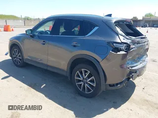 2017 Mazda CX-5 Grand Touring with VIN JM3KFADL6H0217850, listed as a IAAI auction lot 42033404 with 74,198 mi miles and . Bid and sale history available at carsss.com. Image 3.