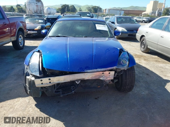 2004 Nissan 350Z Touring with VIN JN1AZ34D34T165329, listed as a IAAI auction lot 41872788 with 199,196 mi miles. Bid and sale history available at carsss.com. Image 6.