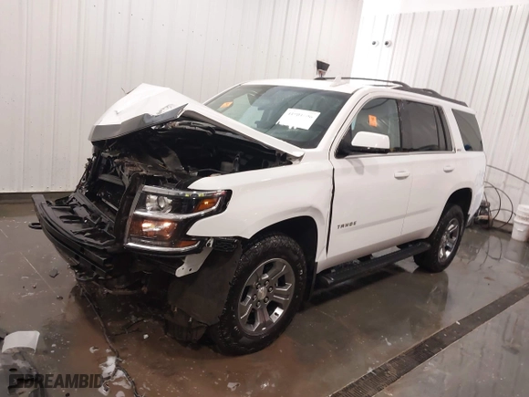 2019 Chevrolet Tahoe LT with VIN 1GNSKBKC5KR280204, listed as a IAAI auction lot 41901606 with 72,919 mi miles. Bid and sale history available at carsss.com. Image 2.
