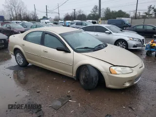 2001 Chrysler Sebring with VIN 1C3EL46U21N529263, listed as a Copart auction lot 82156584 with 57,895 mi miles and Clean Title. Bid and sale history available at DreamBid. Image 4.