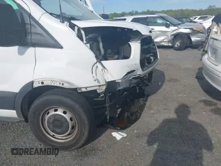 2018 Ford Transit with VIN 1FTYE1YM1JKB29601, listed as a IAAI auction lot 42085587 with 146,846 mi miles and . Bid and sale history available at DreamBid. Image 6.