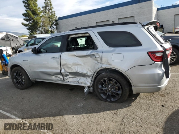 2023 Dodge Durango R/T Plus z VIN 1C4SDHCTXPC685988, wystawiony jako Copart lot #87110694 z przebiegiem 15 216 mil mil oraz Szkoda całkowita • Salvage title. Historia ofert i sprzedaży dostępna na DreamBid. Obrazek 2.