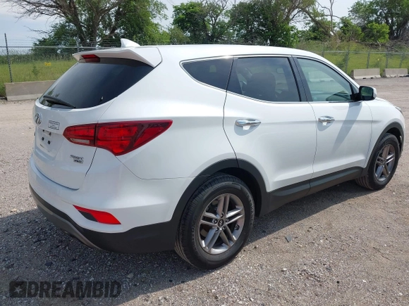 2017 Hyundai Santa Fe 2.4L with VIN 5NMZTDLB5HH018198, listed as a IAAI auction lot 42523632 with 144,883 mi miles and . Bid and sale history available at DreamBid. Image 4.