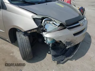 2005 Toyota Sienna XLE with VIN 5TDBA22CX5S049025, listed as a IAAI auction lot 42071795 with 237,858 mi miles. Bid and sale history available at carsss.com. Image 14.