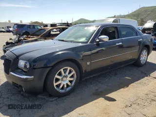 2007 Chrysler 300 C with VIN 2C3KA63HX7H777676, listed as a Copart auction lot 50444015 with 155,189 mi miles and Salvage Title. Bid and sale history available at carsss.com. Image 1.