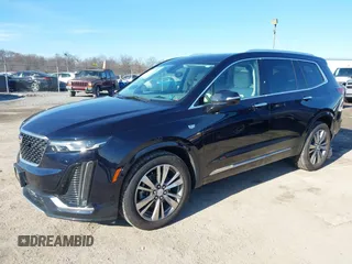 2021 Cadillac XT6 Premium Luxury z VIN 1GYKPDRS8MZ175544, wystawiony jako IAAI lot #41591775 z przebiegiem 39 290 mil mil oraz . Historia ofert i sprzedaży dostępna na DreamBid. Obrazek 17.
