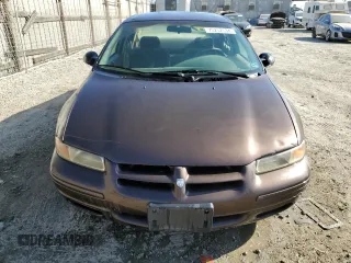 1997 Dodge Stratus z VIN 1B3EJ46X5VN540079, wystawiony jako Copart lot #73252534 z przebiegiem Nie podano mil oraz Tytuł czysty. Historia ofert i sprzedaży dostępna na DreamBid. Obrazek 5.