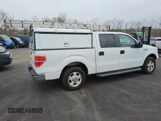 2011 Ford F-150 XL with VIN 1FTEW1CM1BKE10936, listed as a Copart auction lot 50804515 with 222,964 mi miles and Salvage Title. Bid and sale history available at carsss.com. Image 3.