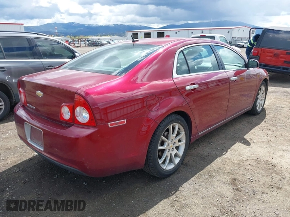 2011 Chevrolet Malibu LTZ with VIN 1G1ZE5E1XBF119559, listed as a IAAI auction lot 42095401 with 145,157 mi miles and . Bid and sale history available at DreamBid. Image 4.