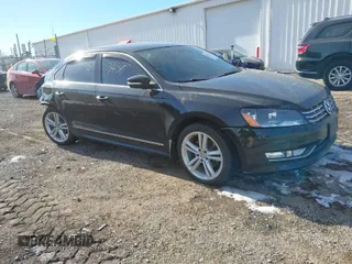 2014 Volkswagen Passat TDI SEL Premium with VIN 1VWCN7A3XEC009727, listed as a IAAI auction lot 41234158 with 146,560 mi miles. Bid and sale history available at carsss.com. Image 1.