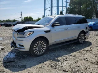 2019 Lincoln Navigator Reserve with VIN 5LMJJ2LT2KEL17957, listed as a Copart auction lot 61777265 with 73,680 mi miles and Salvage title. Bid and sale history available at DreamBid. Image 1.