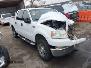 2004 Ford F-150 XLT with VIN 1FTPW12534KC44697, listed as a IAAI auction lot 41147308 with 199,619 mi miles. Bid and sale history available at carsss.com. Image 1.