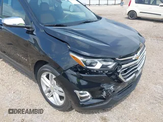 2021 Chevrolet Equinox Premier with VIN 2GNAXNEV5M6151910, listed as a IAAI auction lot 42110010 with 45,911 mi miles and . Bid and sale history available at DreamBid. Image 12.