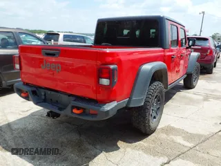 2021 Jeep Gladiator Mojave with VIN 1C6JJTEG6ML533927, listed as a IAAI auction lot 42056253 with 92,317 mi miles and . Bid and sale history available at DreamBid. Image 4.