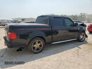 2002 Ford F-150 Harley Davidson with VIN 1FTRW07312KC64714, listed as a Copart auction lot 51275124 with 198,826 mi miles and Non Repairable. Bid and sale history available at carsss.com. Image 3.