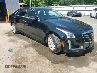 2015 Cadillac CTS Luxury AWD с VIN 1G6AX5SX0F0105415, выставлен на аукционе Copart как лот 62143995 с пробегом 72 614 миль миль и Списание • Salvage title. История ставок и продаж доступна на DreamBid. Изображение 13.