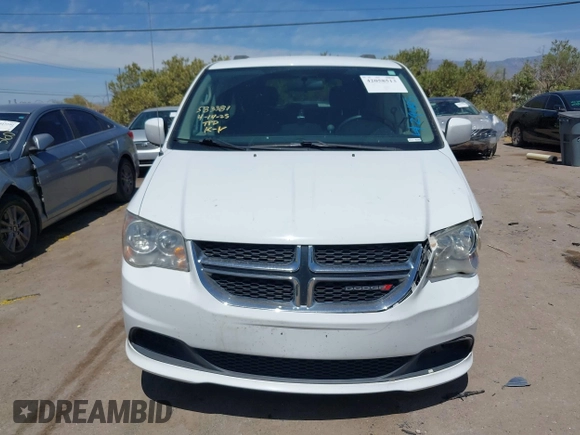 2014 Dodge Grand Caravan SXT with VIN 2C4RDGCG1ER429495, listed as a IAAI auction lot 42058513 with 136,936 mi miles and . Bid and sale history available at DreamBid. Image 12.