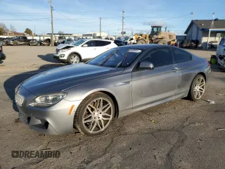 2015 BMW 6 Series 650i with VIN WBAYM9C53FD248356, listed as a Copart auction lot 85499554 with 115,292 mi miles and Salvage Title. Bid and sale history available at carsss.com. Image 1.