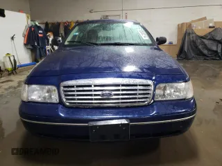 2004 Ford Crown Victoria LX z VIN 2FAFP74W94X171212, wystawiony jako Copart lot #82830214 z przebiegiem 217 595 mil mil oraz Szkody całkowita. Historia ofert i sprzedaży dostępna na DreamBid. Obrazek 5.