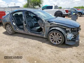 2021 Mazda 3 Select with VIN JM1BPABLXM1323957, listed as a Copart auction lot 62337215 with 75,068 mi miles and Salvage title. Bid and sale history available at DreamBid. Image 4.