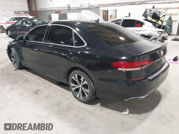 2021 Volkswagen Passat SE z VIN 1VWSA7A39MC001401, wystawiony jako IAAI lot #42019308 z przebiegiem 82 203 mil mil oraz . Historia ofert i sprzedaży dostępna na DreamBid. Obrazek 3.