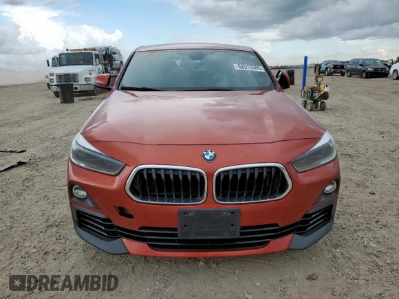 2018 BMW X2 sDrive28i with VIN WBXYJ3C37JEJ75893, listed as a Copart auction lot 62513565 with 62,029 mi miles and Salvage title. Bid and sale history available at DreamBid. Image 5.