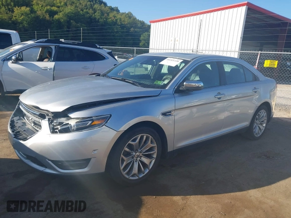 2014 Ford Taurus Limited with VIN 1FAHP2F8XEG133523, listed as a IAAI auction lot 40285220 with 134,939 mi miles. Bid and sale history available at carsss.com. Image 2.