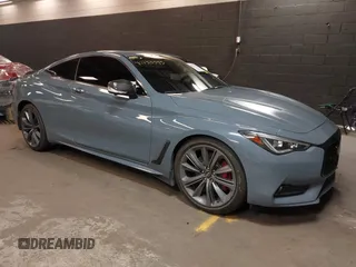 2022 Infiniti Q60 Red Sport 400 with VIN JN1FV7LL4NM681132, listed as a IAAI auction lot 40733343 with 14,309 mi miles and . Bid and sale history available at DreamBid. Image 1.