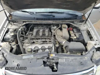 2009 Ford Taurus Limited z VIN 1FAHP25W59G101519, wystawiony jako Copart lot #55035935 z przebiegiem 142 496 mil mil oraz Szkody całkowita. Historia ofert i sprzedaży dostępna na DreamBid. Obrazek 11.