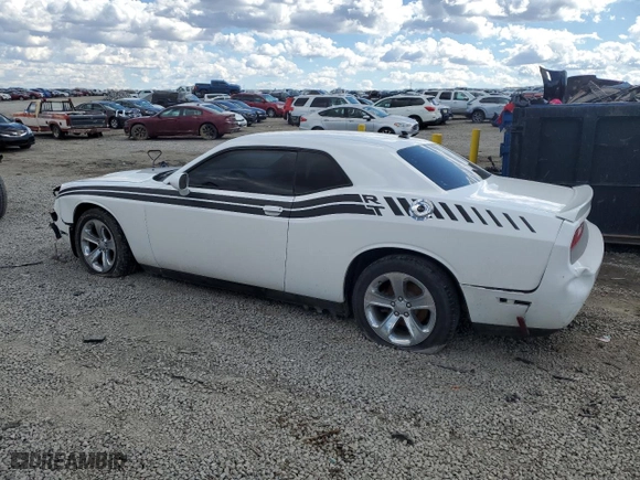 2012 Dodge Challenger SXT Plus with VIN 2C3CDYAG7CH128168, listed as a Copart auction lot 47273945 with 196,025 mi miles and Salvage Title. Bid and sale history available at carsss.com. Image 2.
