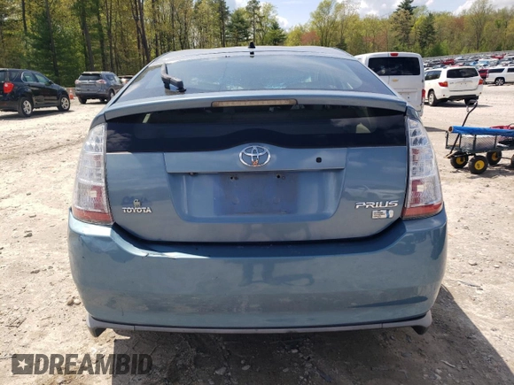 2007 Toyota Prius z VIN JTDKB20U377642098, wystawiony jako Copart lot #56205795 z przebiegiem Nie podano mil oraz Czysty tytuł • Clean title. Historia ofert i sprzedaży dostępna na DreamBid. Obrazek 6.