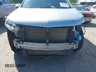 2020 Chevrolet Traverse LT Cloth z VIN 1GNERGKW3LJ177069, wystawiony jako IAAI lot #42080588 z przebiegiem 91 630 mil mil oraz . Historia ofert i sprzedaży dostępna na DreamBid. Obrazek 6.