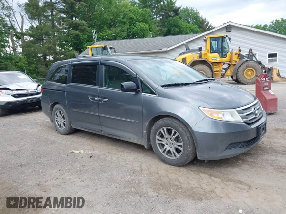2012 Honda Odyssey EX z VIN 5FNRL5H45CB084342, wystawiony jako IAAI lot #42329303 z przebiegiem 173 711 mil mil oraz . Historia ofert i sprzedaży dostępna na DreamBid. Obrazek 1.