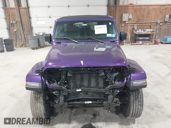 2023 Jeep Wrangler Sahara with VIN 1C4HJXEN9PW560958, listed as a IAAI auction lot 41980179 with 35,975 mi miles and . Bid and sale history available at DreamBid. Image 13.